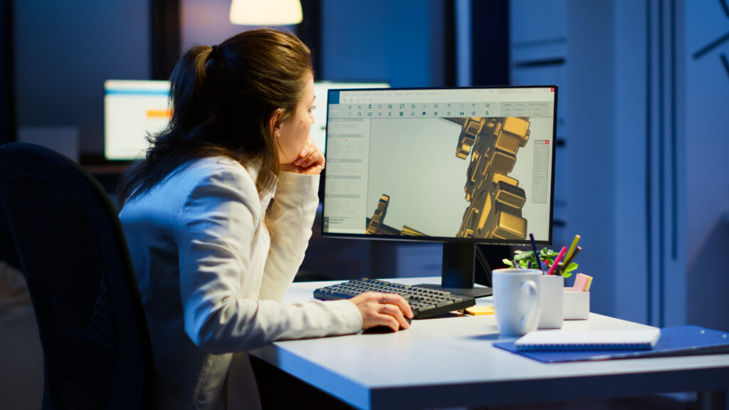 Tired woman architect working on modern cad program overtime image