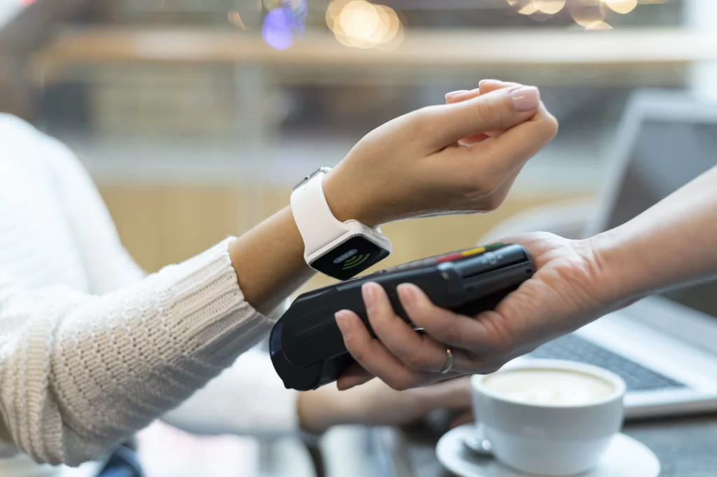 person-paying-with-its-smartwatch-wallet-app image