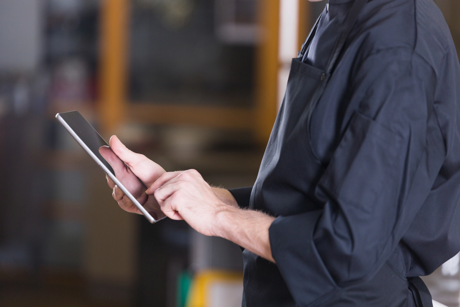 Chef holding tablet image