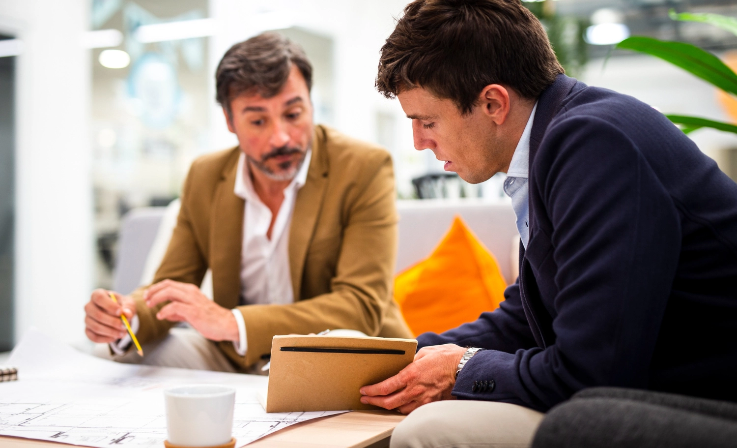 male cowrkers planning sketeches image